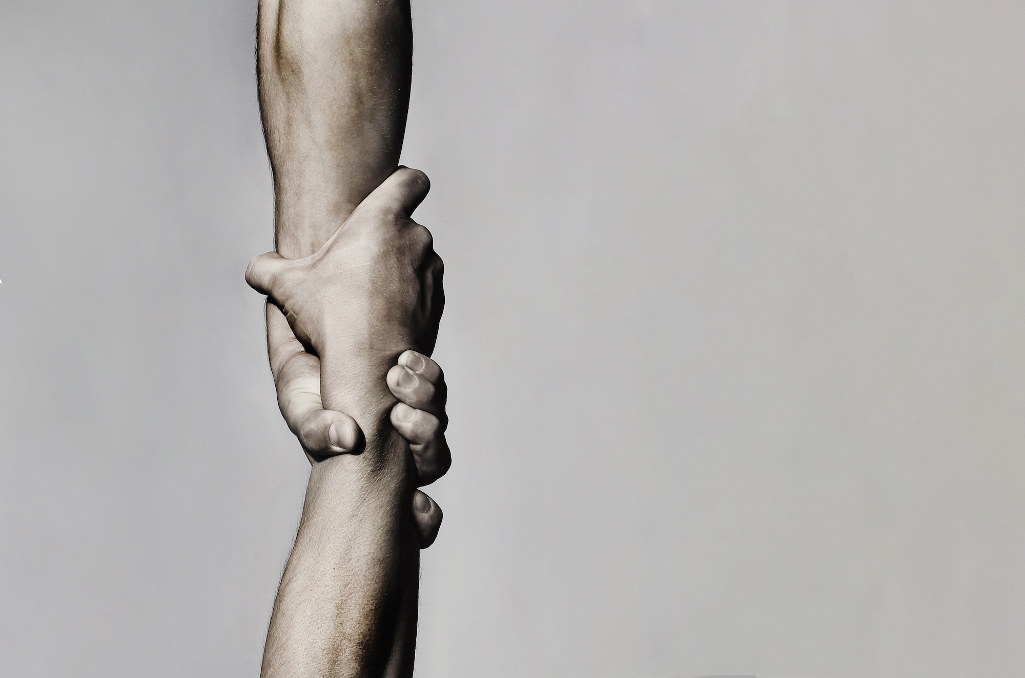 Photo symbolizes helping hands for those with Wisconsin Welfare Trust Fund who want to go to rehab in Wisconsin